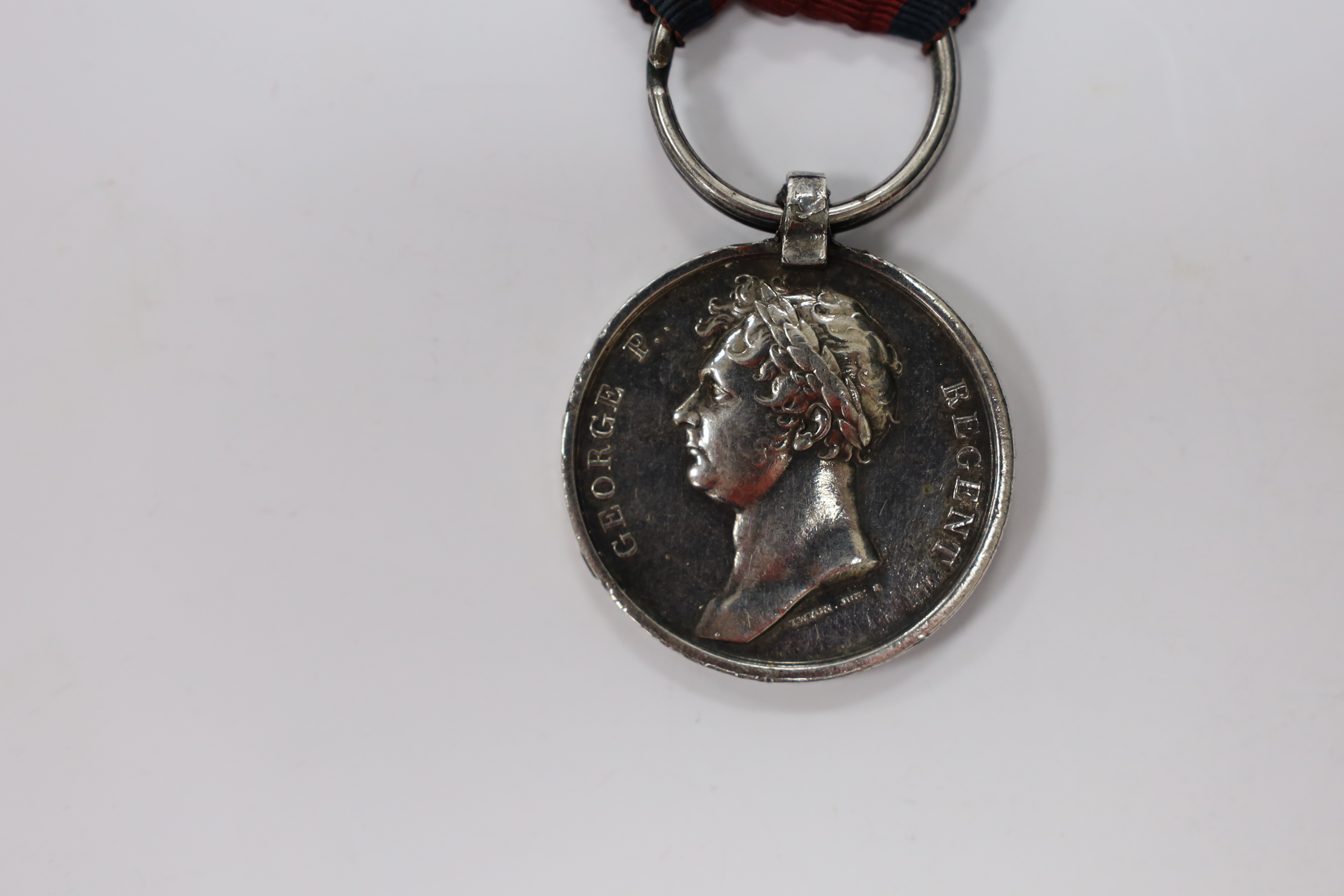 A Waterloo Medal 1815 replica, named for William Rose 1st Batt 79th Regt Foot